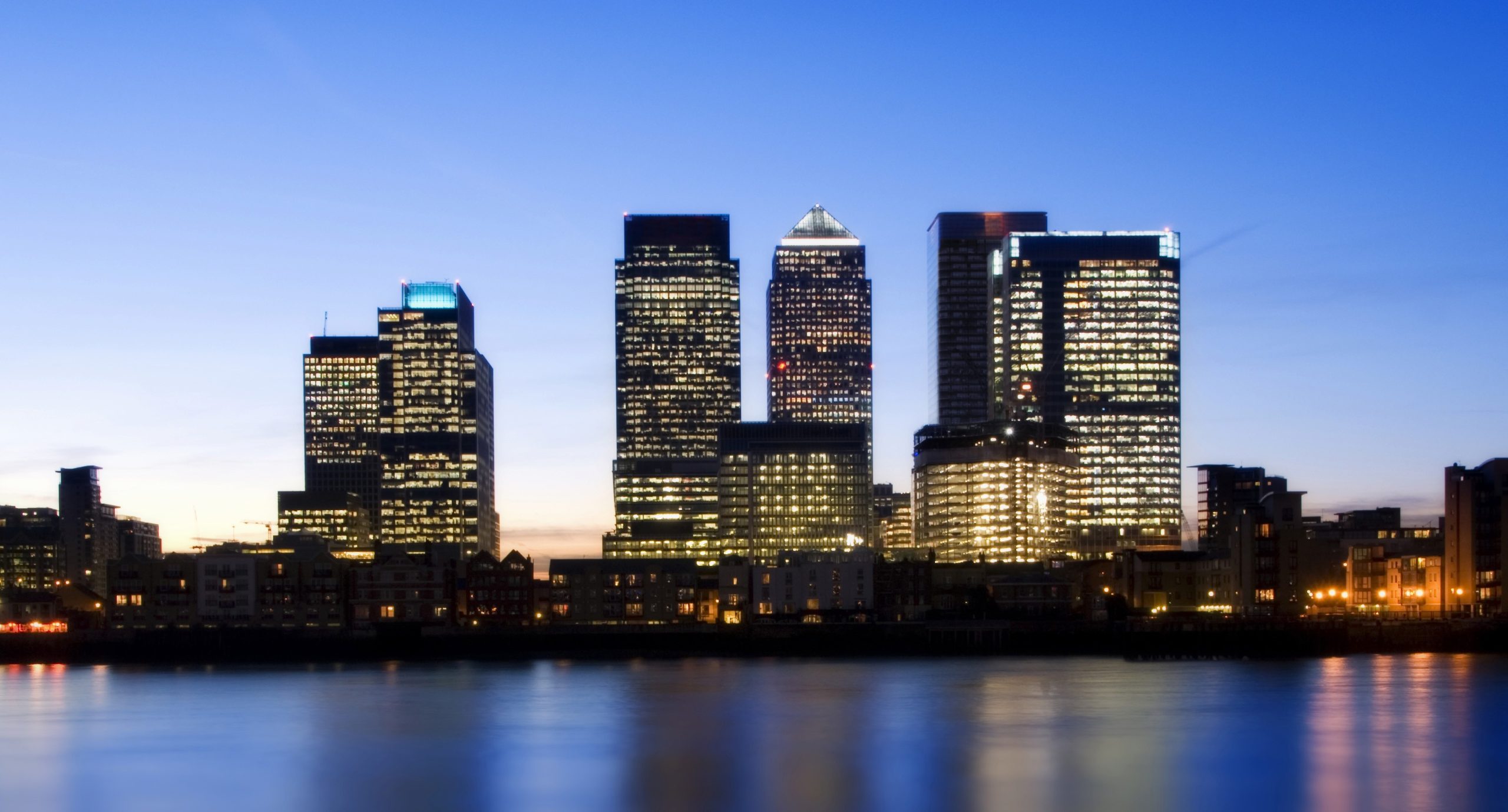 Canary Wharf area of London at sunset.