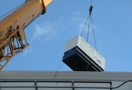 Generator being craned